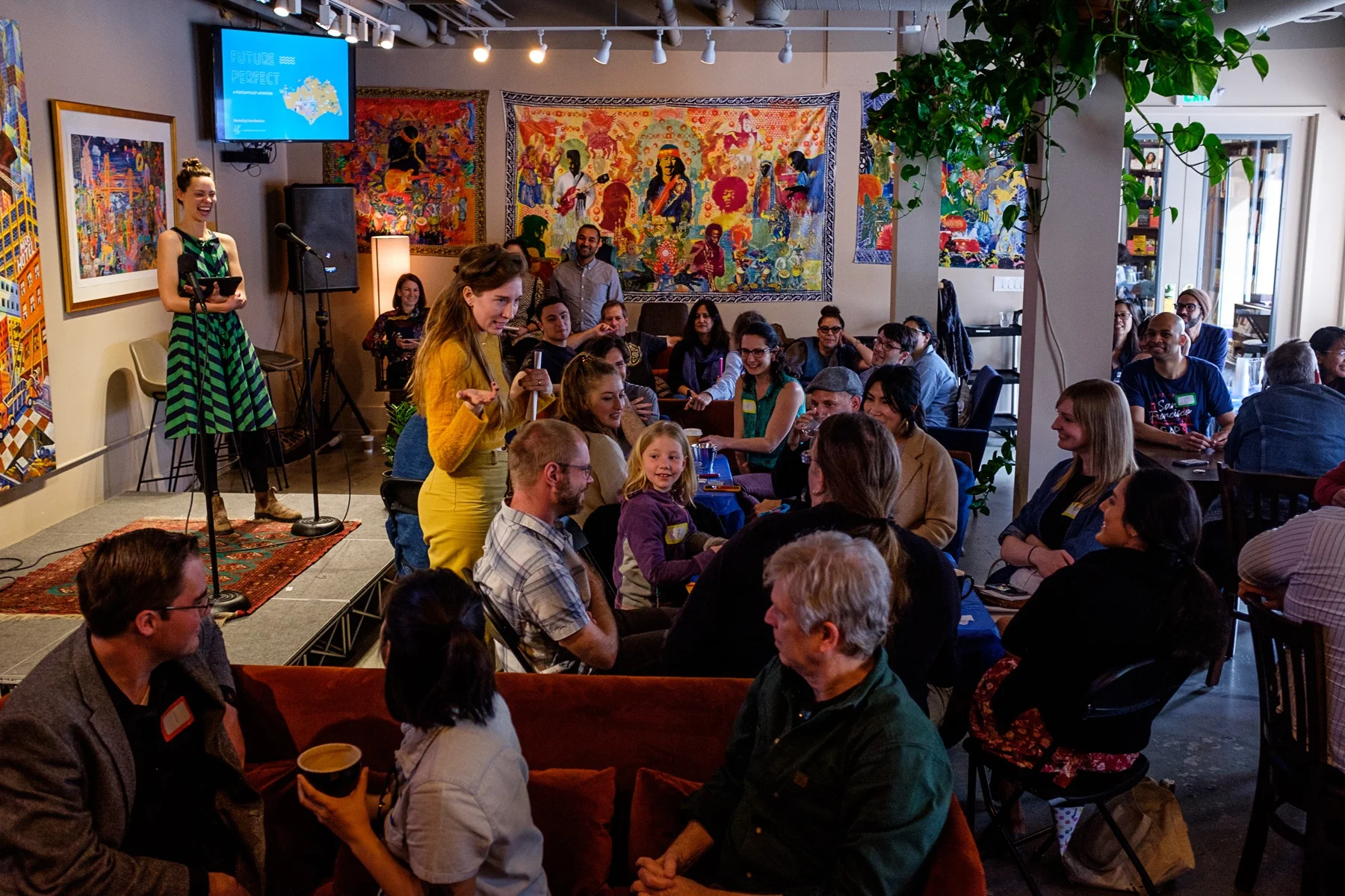 Free Machine community event — participants engaged in Future Perfect